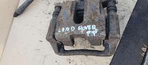 Zacisk hamulcowy lewy tył tylny lewy Land Rover Discovery III 5