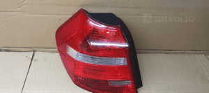 Lampa lewy tył tylna lewa BMW I E81 E87 Lift 7164955 2