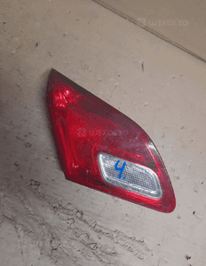 OPEL ASTRA J HB Lampa tył lewa w klapę 4