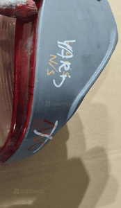 Lampa lewa tył tylna toyota yaris i 1 hb 2