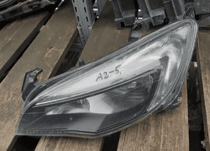 Przod przednia lampa lewa opel astra j 1
