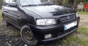 Mazda Demio 97- Maska lampa zderzak pas atrapa 16W 3