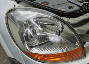 Renault Kangoo I lift  lampa przód przednia lewa 1