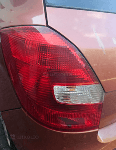 Skoda Fabia II 2 lampa tył tylna prawa lewa 4