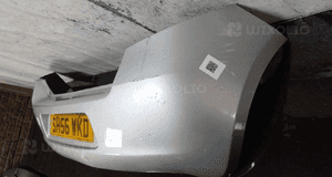 Zderzak tył tylny do toyota yaris ii 2 hb 1E7 srebrny 3
