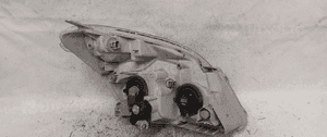 Przod przednia lampa lewa toyota corolla verso 1 2