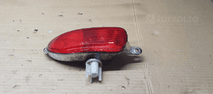 Lampa zderzaka lewy tył tylna lewa Opel Corsa C 24409337 89304951 2