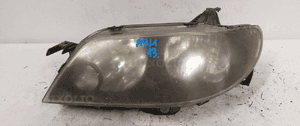 .   PRZOD PRZEDNIA LAMPA LEWA MAZDA 323F 1