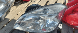 Przod przednia lampa lewa kia rio 2 lift 1