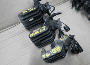 ZACISK HAMULCOWY LEWY TYŁ AUDI A4 A6 RADOM