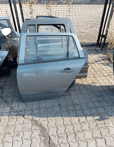 drzwi lewe tył astra h kombi