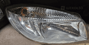 Skoda Fabia II 2 lampa przód przednia  prawa 9