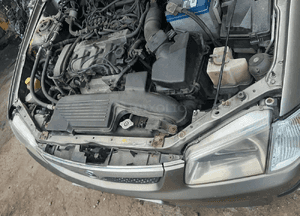 Mazda 323 323f BJ 98-03  Maska lampa zderzak pas atrapa 12M 6