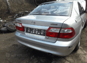Mazda 626 GF 97-02 błotnik przedni przód Prawy Lewy w lampa szyba  kolor 8