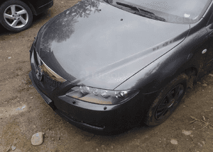 Mazda 6 02-07 Maska lampa zderzak pas atrapa 32G 4