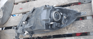 Przod przednia lampa lewa nissan note E11 3