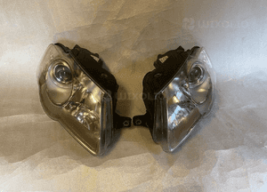Vw passat B6 lampa prawa i lewa hella 1