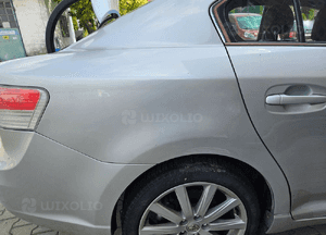 Toyota Avensis T27 sedan błotnik tył tylny prawy lewy 1F7 2