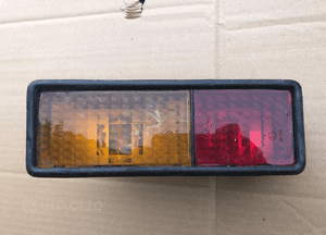 Lampa tylna lewa dolna w zderzak Land Rover Discovery 1 I