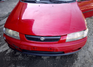 Mazda 323 323p BA Błotnik przedni Lewy Prawy SU 3