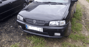 Mazda Demio 97- Maska lampa zderzak pas atrapa 16W 1