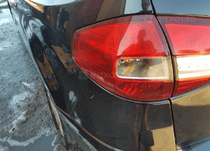 lampa lewa tył koleos w blotnik