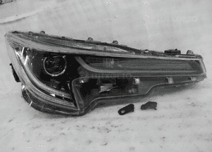 Toyota corolla E21 lampa przednia prawa 1