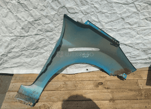 Błotnik przód przedni prawy lewy ford fiesta MK7 lift 8