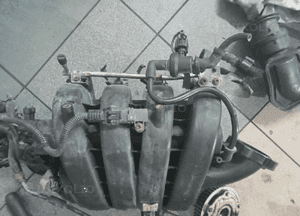 kolektor ssący zafira b 1.8 55563685