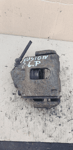 Zacisk hamulcowy lewy przód przedni lewy Ford Fusion 1