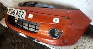 Zderzak przód przedni do nissan note R10 rudy pomarańczowy halogeny 3