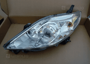 Mazda 5 V lampa przod xsenon prawa  06 3