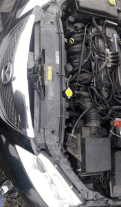 Mazda 6 02-07 Maska lampa zderzak pas atrapa 16W 7