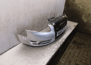 Audi A4 B7 zderzak przód przedni halogeny LY7W srebrny 4