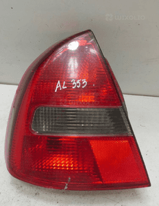 Lampa lewa tył mitsubishi carisma lift 1