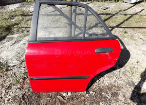 Mazda 323 bj 98-03 Sedan Drzwi szyba lewe tył 18G 22V 4