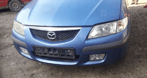 Mazda Premacy Maska lampa zderzak pas atrapa 4Y 3