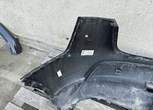 Zderzak tył tylny tesla model y 2020-  spoiler dół 1493763-00-A orygi cały 4