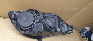 Lampa lewy przód przednia lewa VW Golf V Plus 7