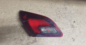 Lampa lewy tył opel astra j gtc 1