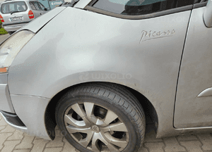 Citroen C4 Grand Picasso I blotnik prawy lewy  przod przedni EZRC 6