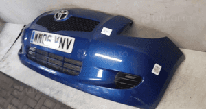 Zderzak przód przedni toyota yaris 2 ii 8T0 niebieski błękitny 3