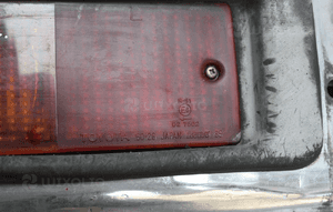 Lampa tylna lewa w zderzak Toyota Land Cruiser 4