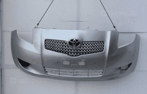Zderzak przedni przód kompletny TOYOTA YARIS II kolor 1E7 2005-2011 1