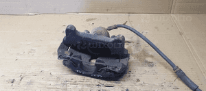 Zacisk hamulcowy prawy przód przedni VW Passat B6 5