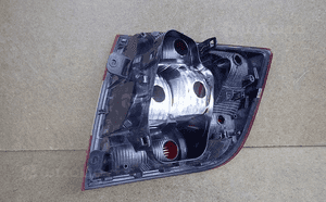 Lampa lewa tylna tył skoda rapid fl liftback 5J 2