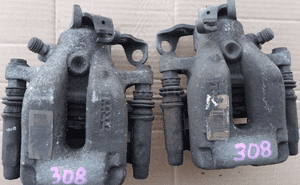 Citroen C4 I Peugeot 308 T7 zacisk hamulcowy tyl tylny  prawy lewy 6