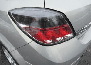 Lampa tył tylna lewa opel astra 3 iii h lift 3D gtc 2006-
