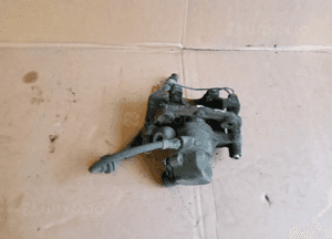 Zacisk hamulcowy lewy tył tylny lewy Ford Focus MK2 4