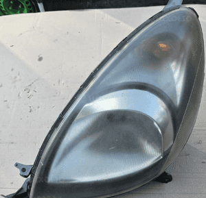 Toyota Yaris Verso lampa przód przednia  lewa 2